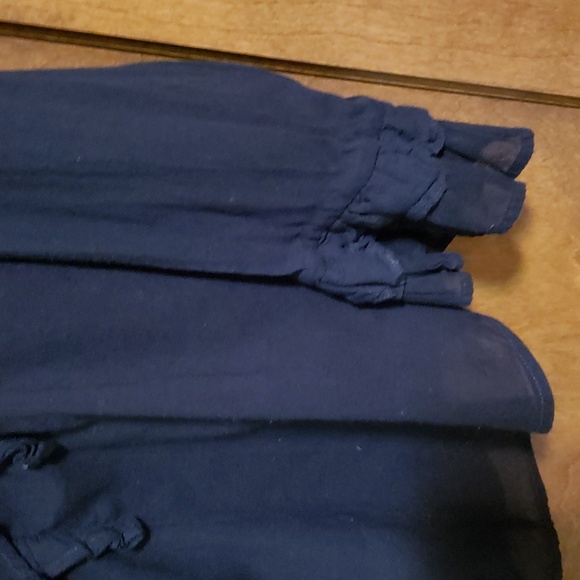 Sheer black button down shirt with ruffled chest and cuffs. - Picture 3 of 4